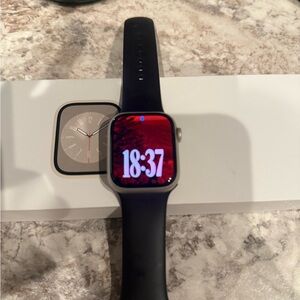 Apple Smartwatch with Black Band and Silver Case